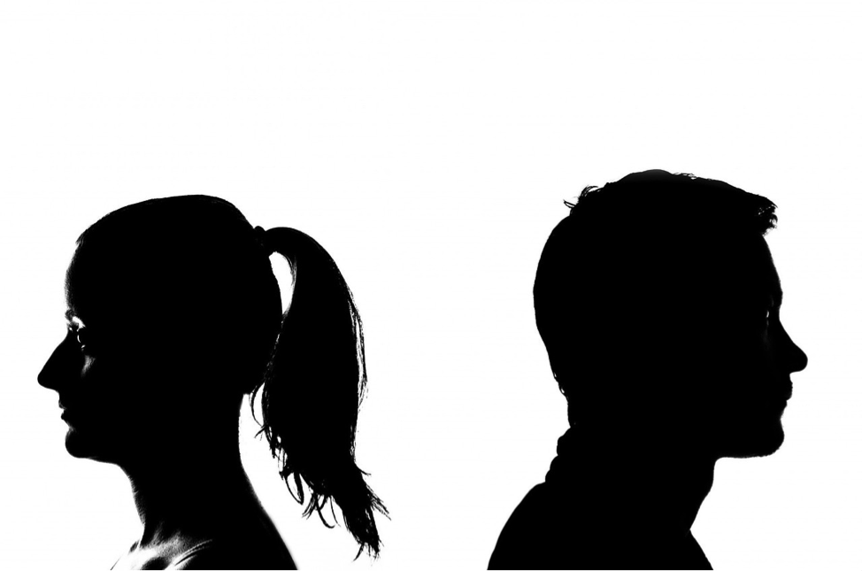 Silhouette man and woman with their backs turned